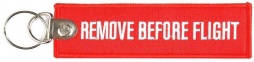 Tekstilni obesek - Remove Before Flight